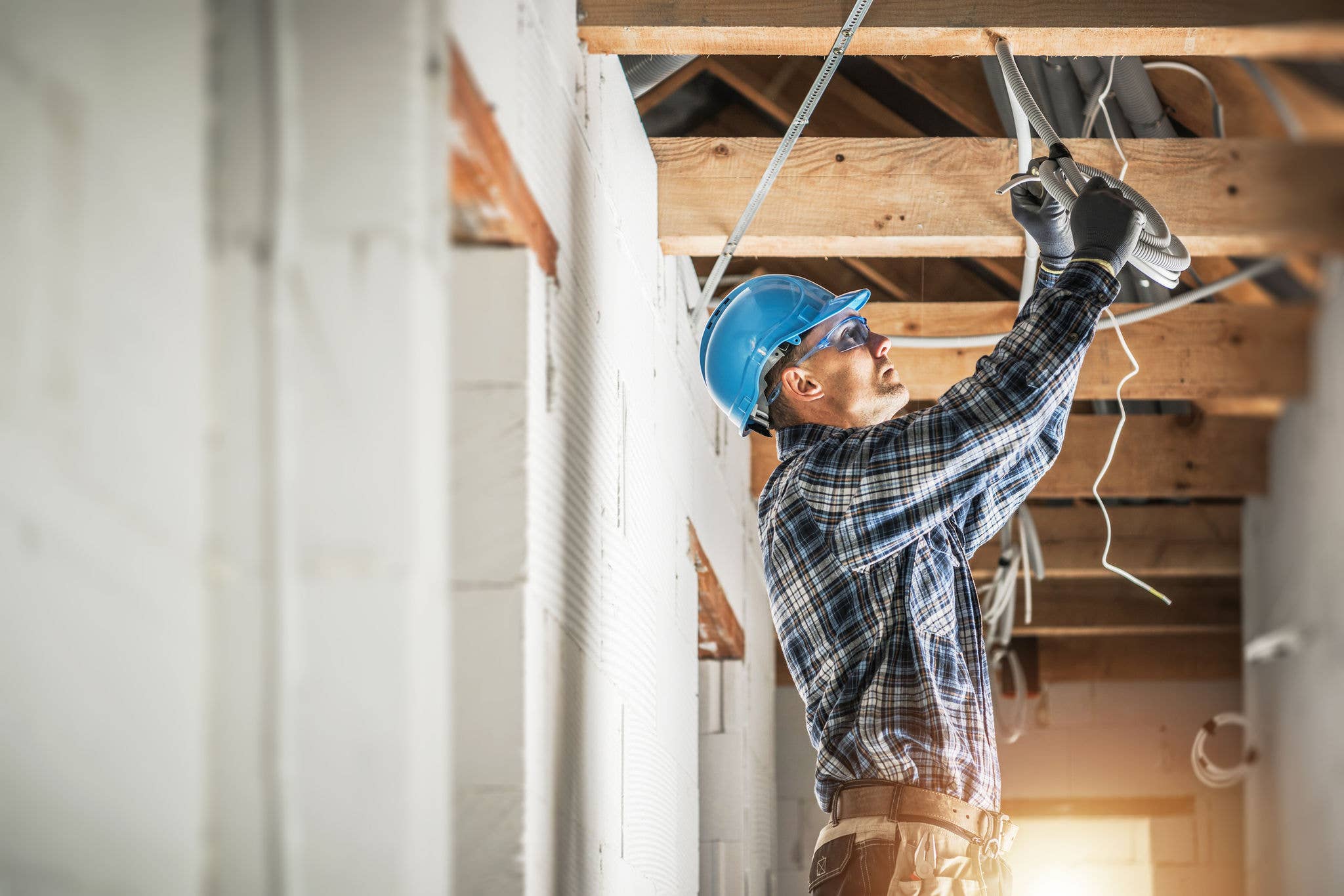 Electrician fixing wiring in home