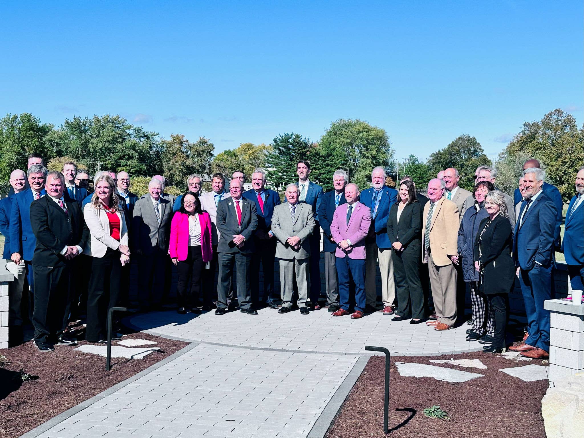 COUNTRY Financial, the Illinois Farm Bureau, the Illinois State Historical Society and other members of the community gather for the dedication of a new historical marker