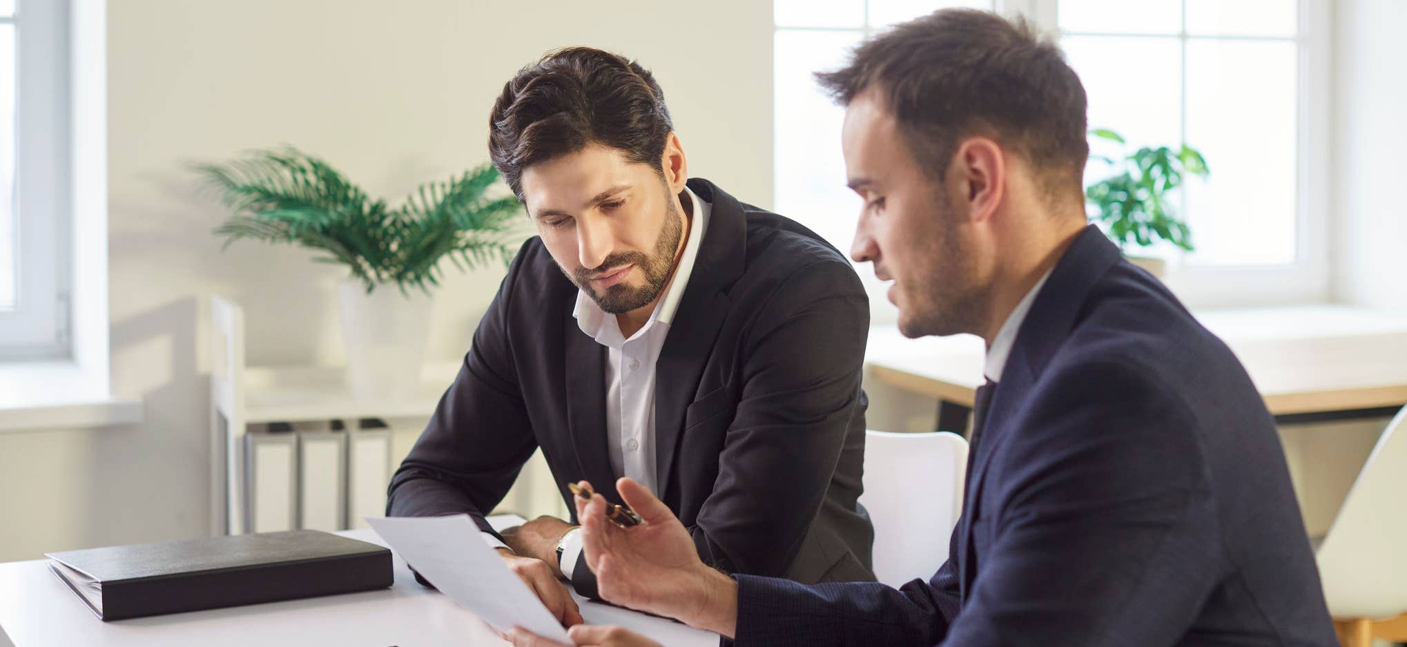 Lawyer talking to client