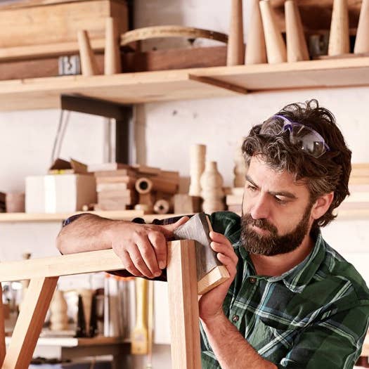 Carpenter making a chair