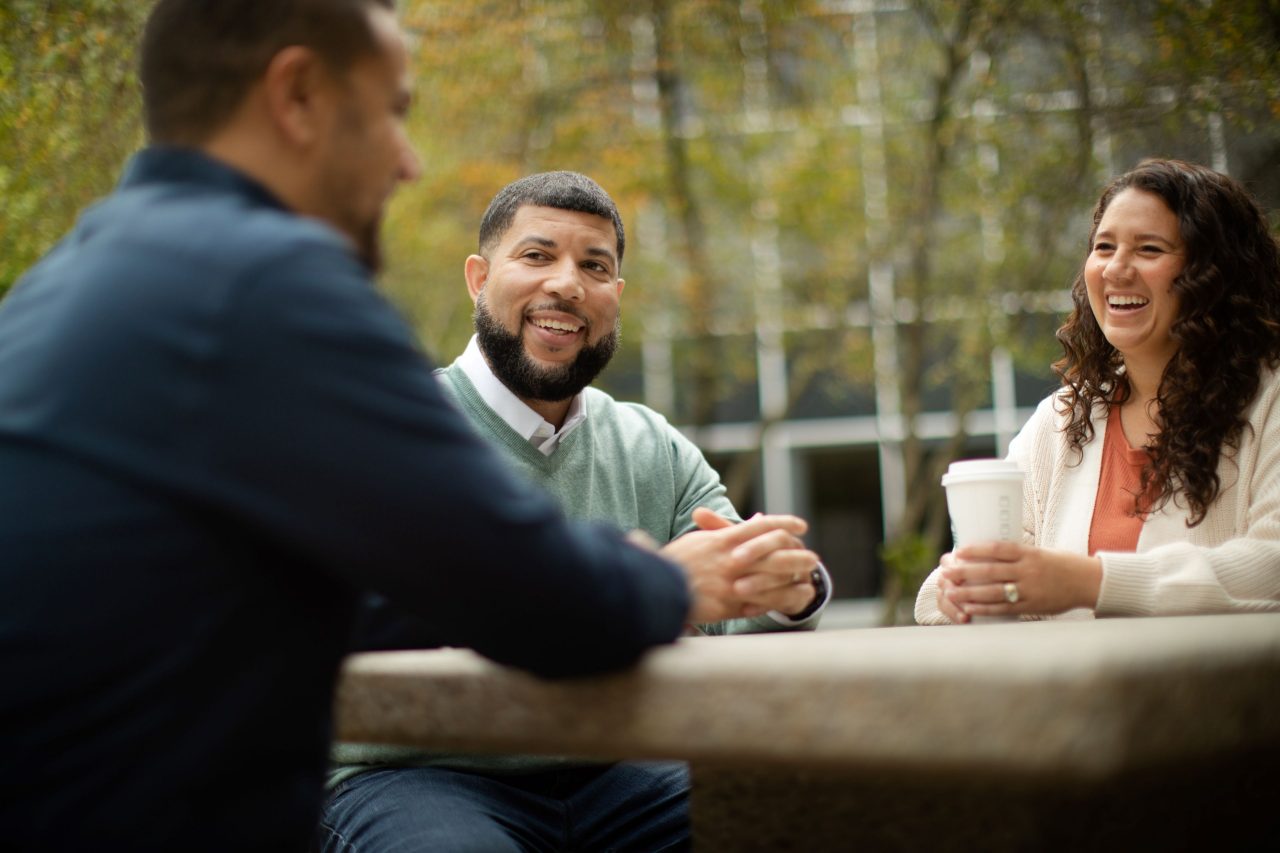 Woman holding diverse meeting