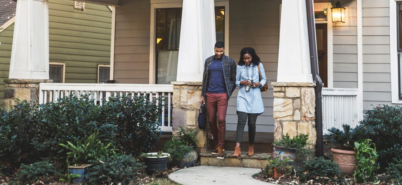 couple leaving house