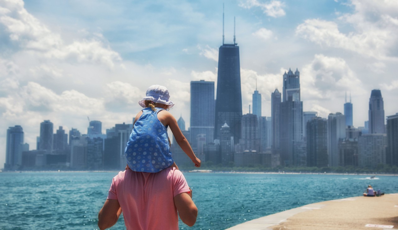 Father and daughter with Chicago skyline