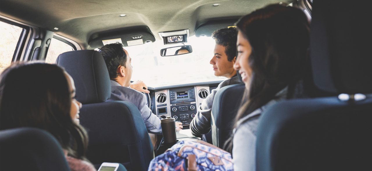 family in car