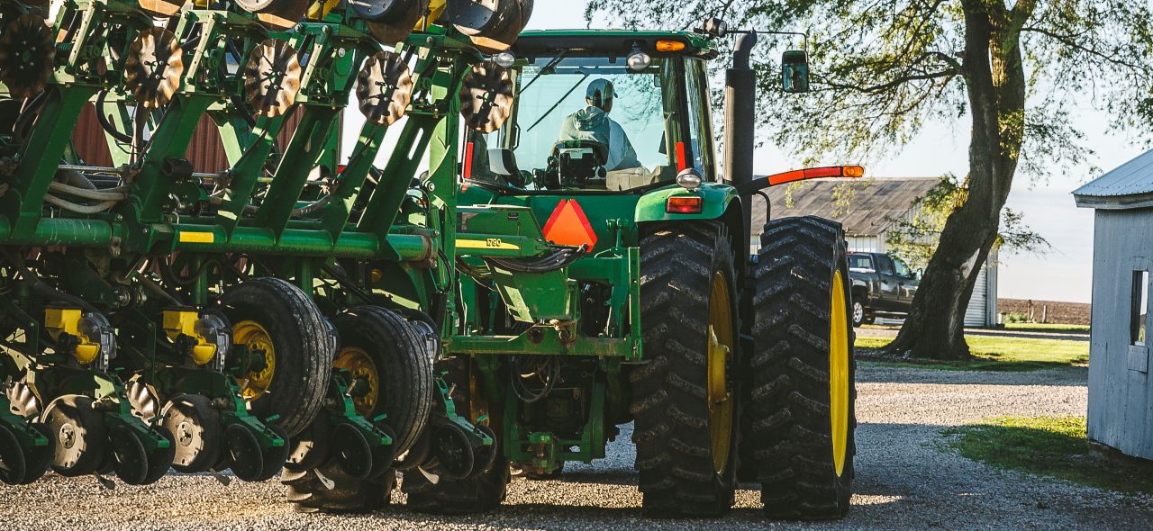 Farm tractor and rural roadway