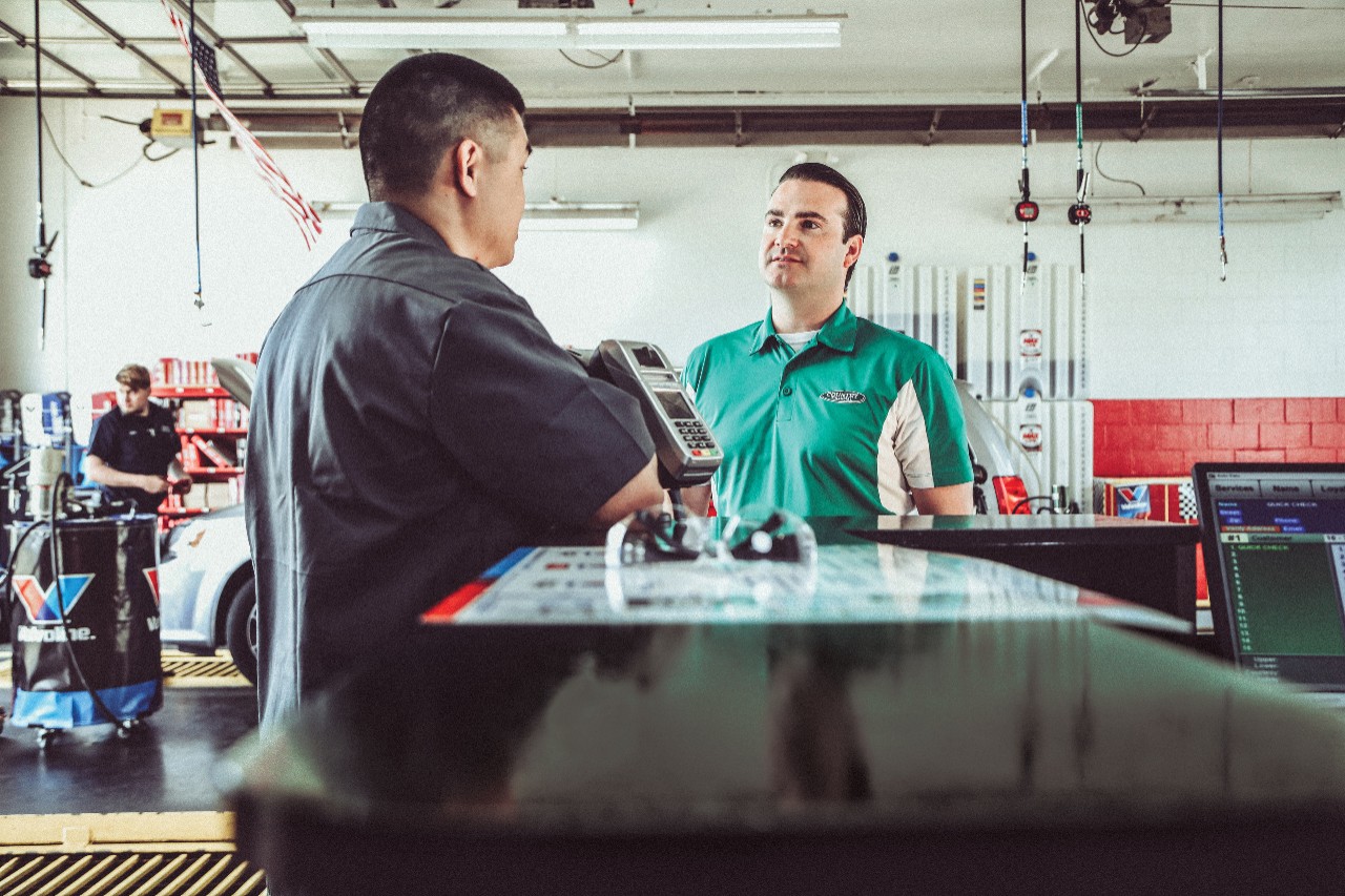 COUNTRY Financial agent talking with a business owner