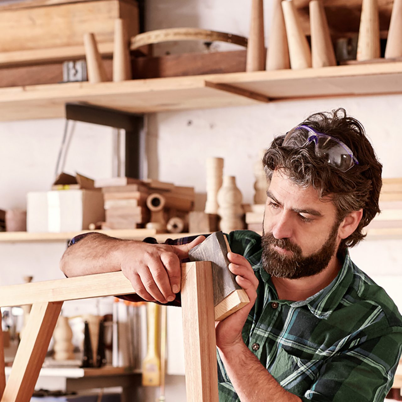 Carpenter making a chair