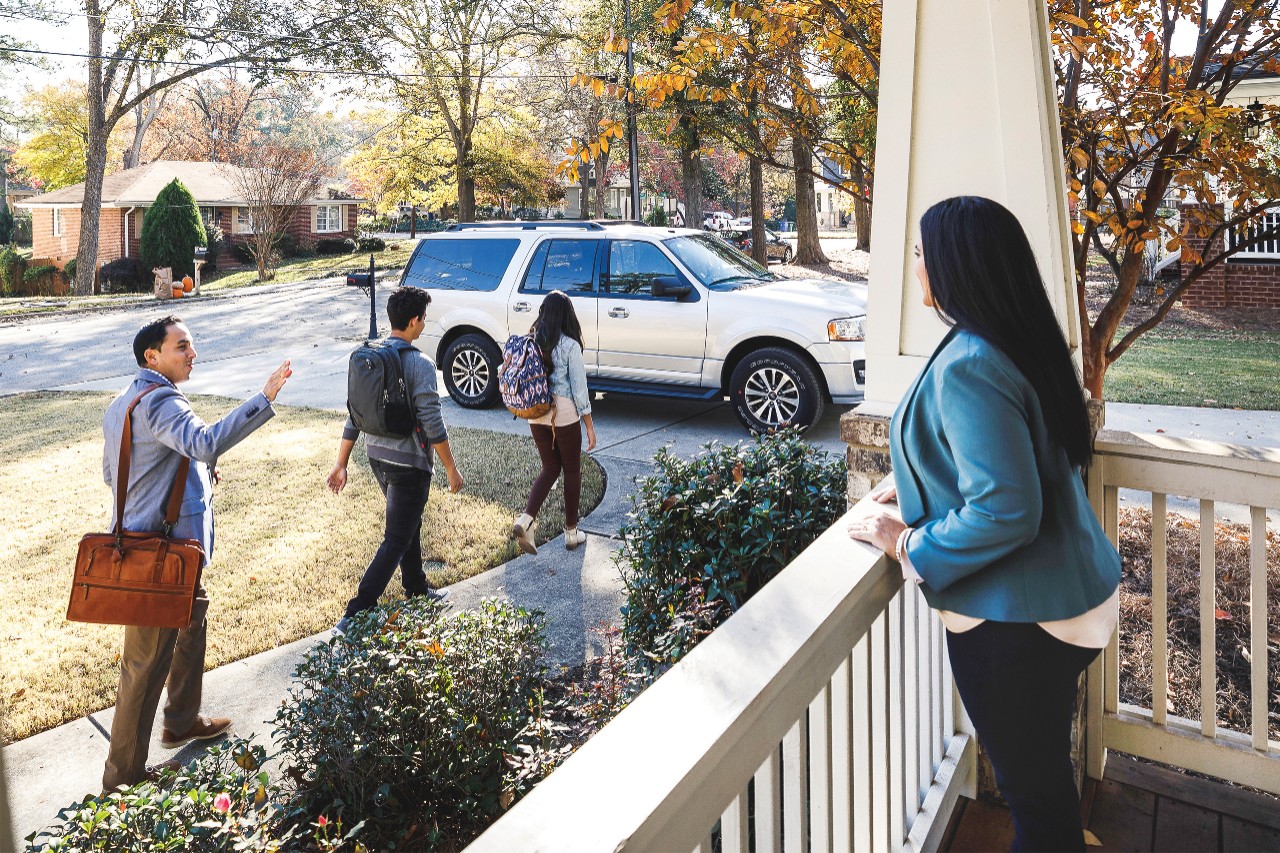 Family leaving the house for school and work