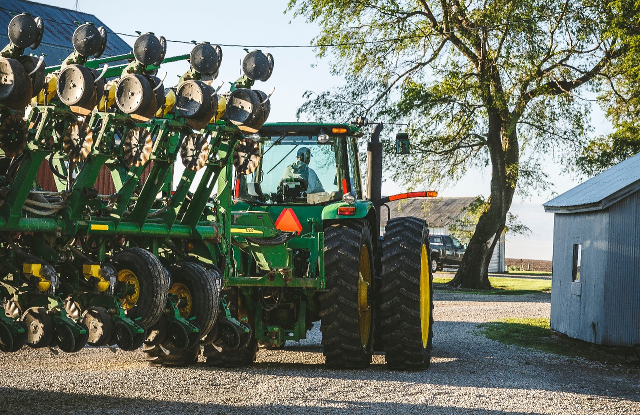 Farm tractor and rural roadway